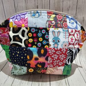 Patchwork makeup bag with curved top