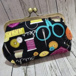Sewing themed clasp purse